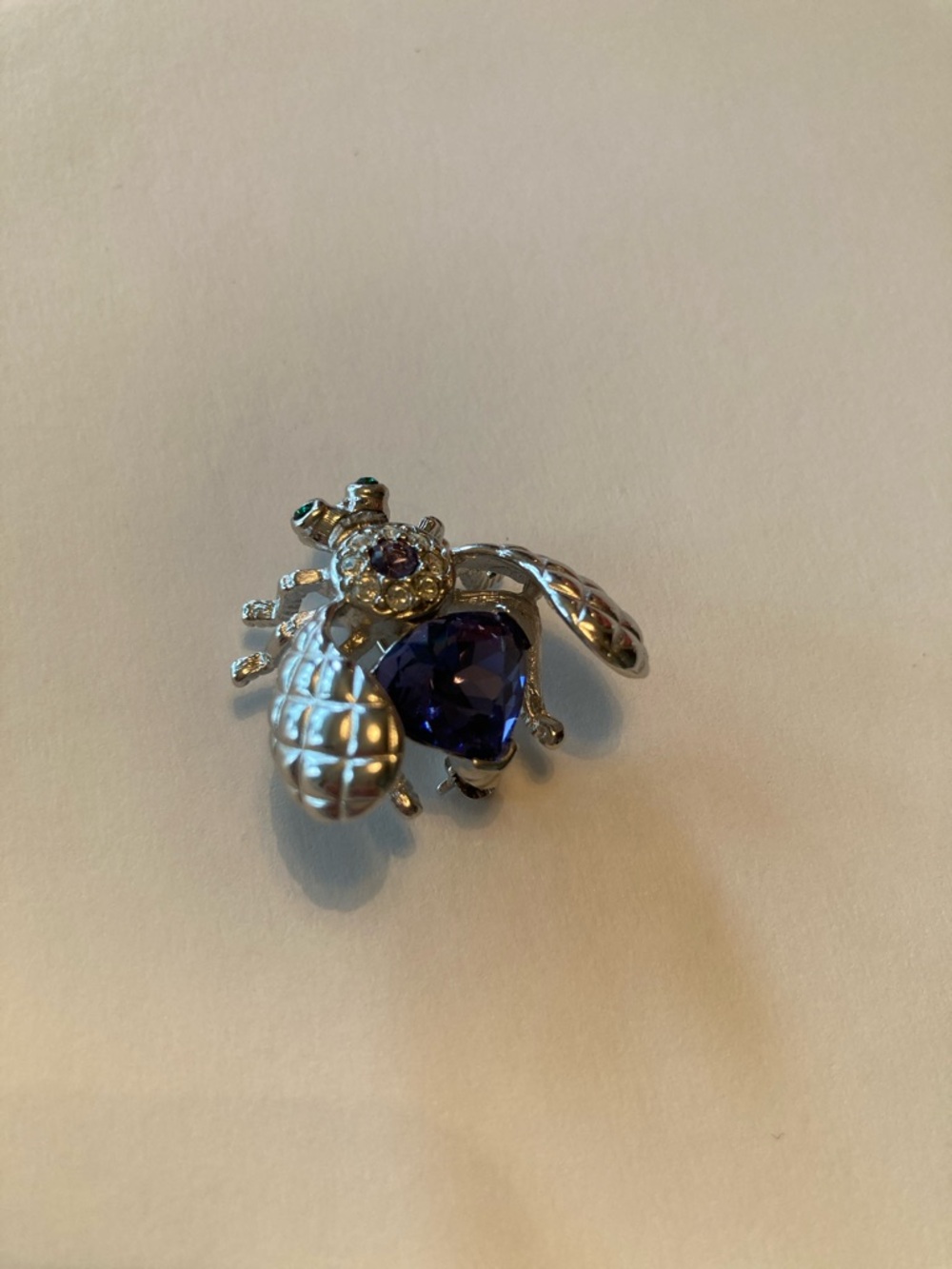 Joan Rivers Silver Bee Brooch with Deep Purple Gem